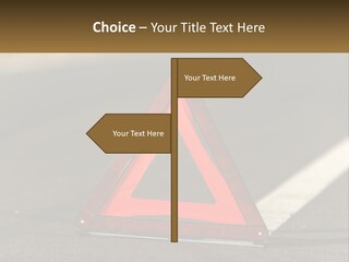 A Red Triangle Sign Sitting On The Side Of A Road PowerPoint Template