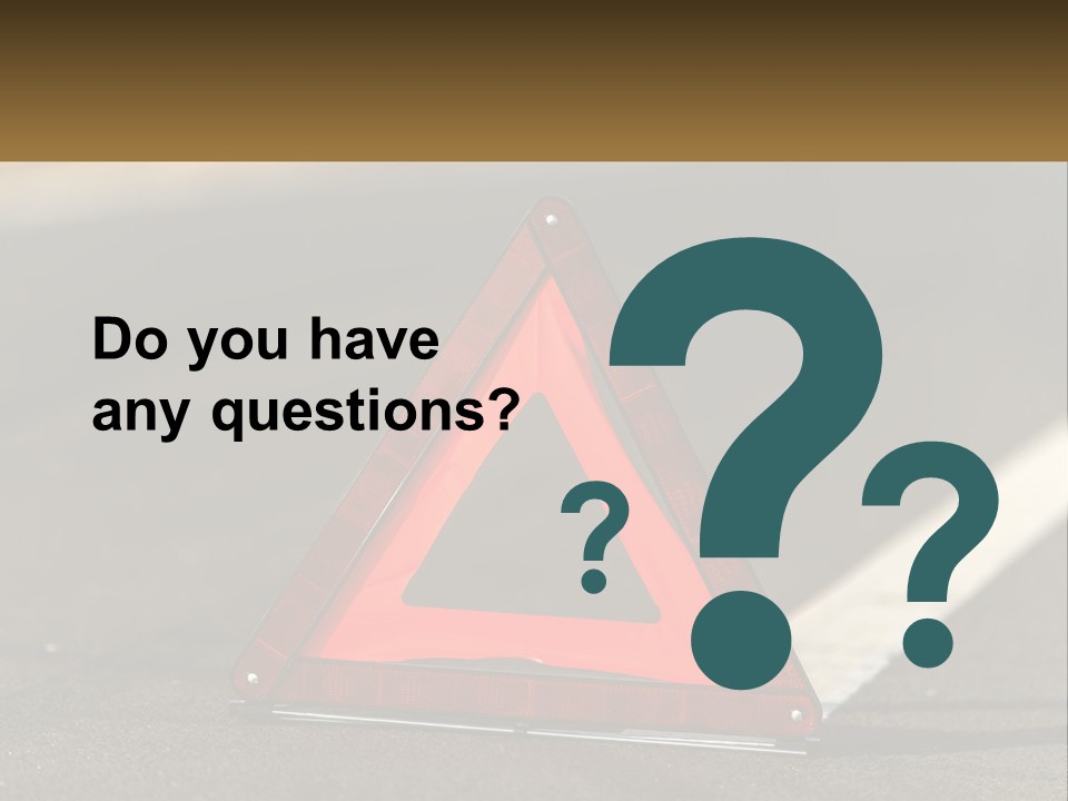 A Red Triangle Sign Sitting On The Side Of A Road PowerPoint Template