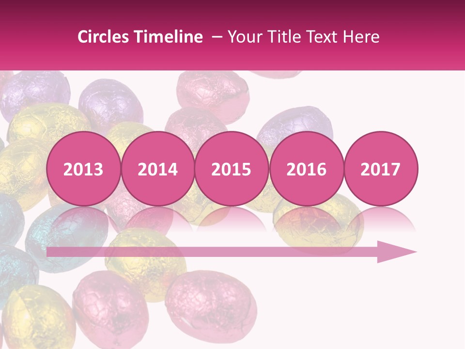 A Pile Of Chocolate Eggs Sitting On Top Of A Table PowerPoint Template