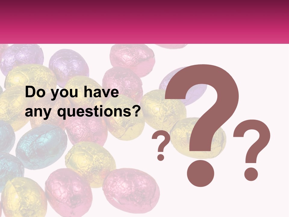 A Pile Of Chocolate Eggs Sitting On Top Of A Table PowerPoint Template