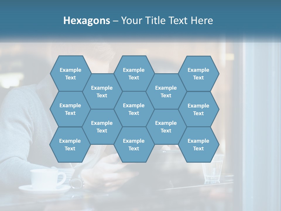 A Man Sitting At A Table Using A Tablet PowerPoint Template