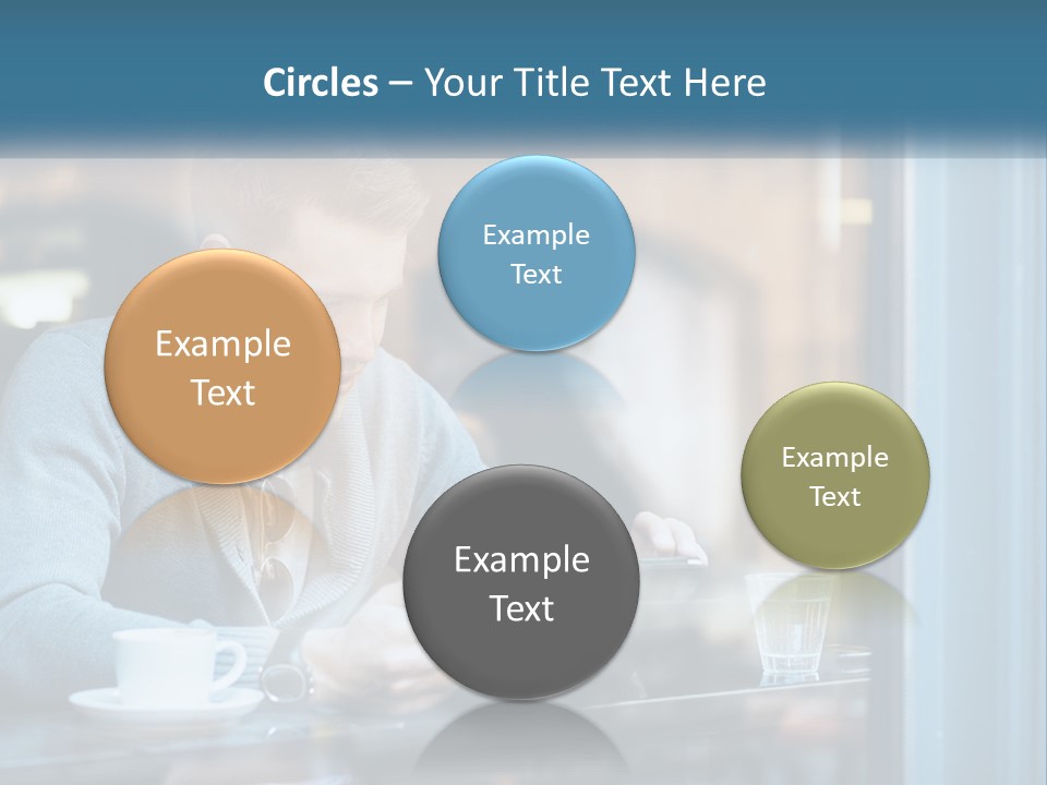 A Man Sitting At A Table Using A Tablet PowerPoint Template