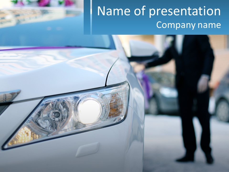 A Man In A Suit Standing Next To A Car PowerPoint Template