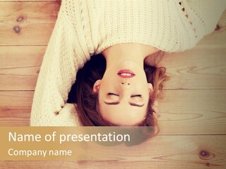 A Woman Laying Down On A Wooden Floor With Her Eyes Closed PowerPoint Template