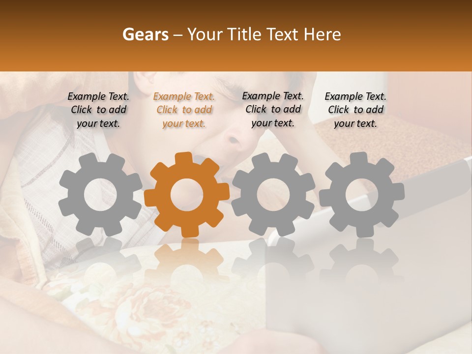 A Young Boy Laying In Bed Using A Laptop Computer PowerPoint Template