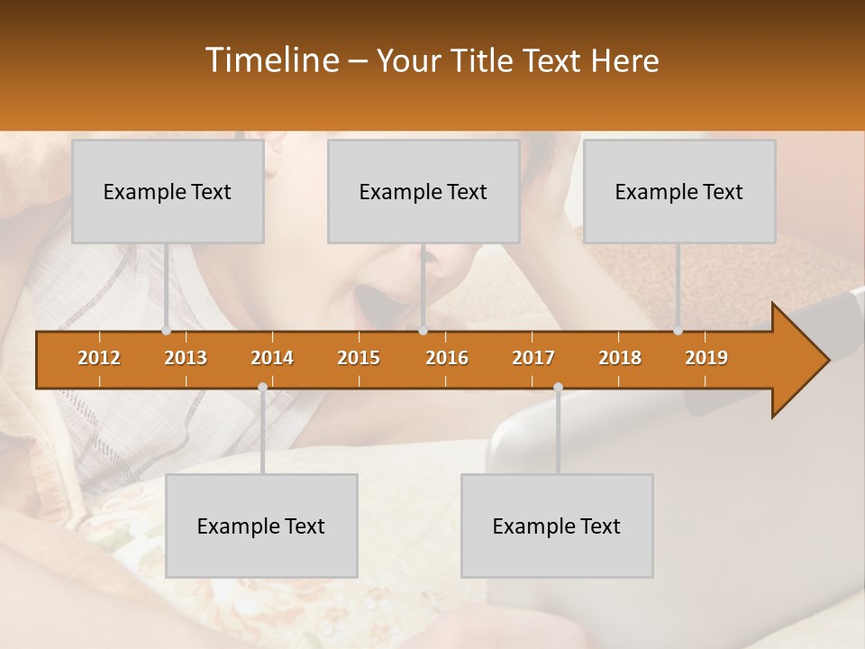 A Young Boy Laying In Bed Using A Laptop Computer PowerPoint Template