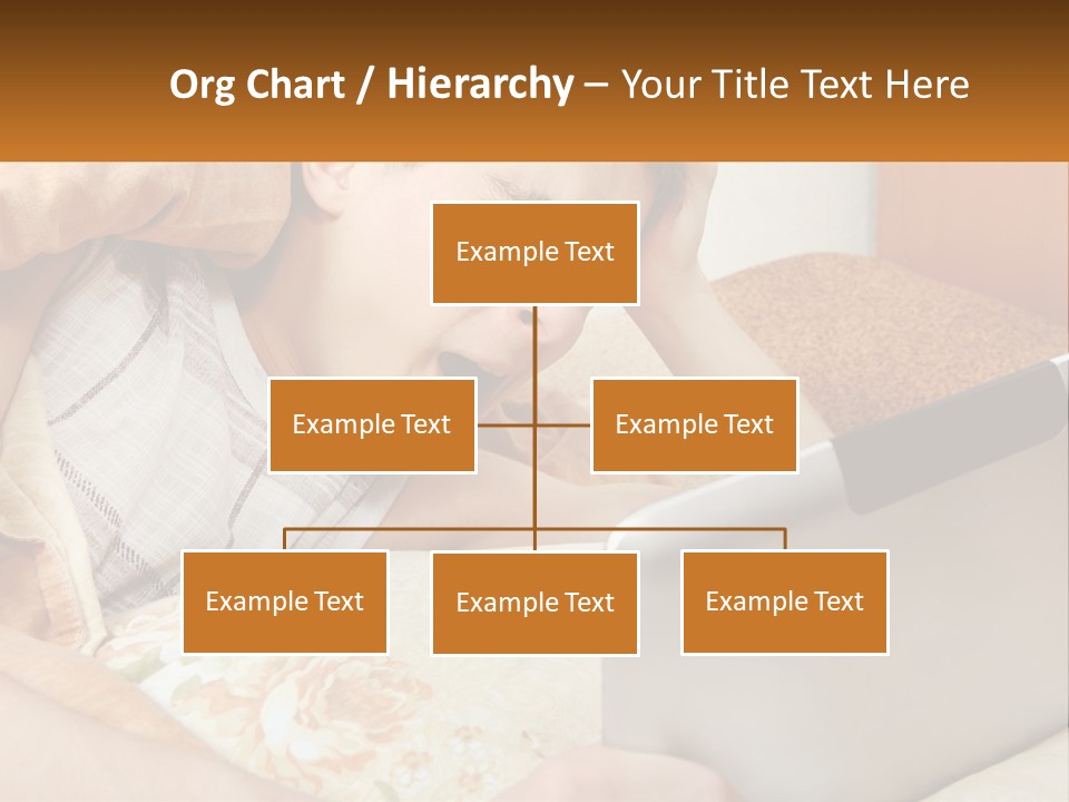 A Young Boy Laying In Bed Using A Laptop Computer PowerPoint Template
