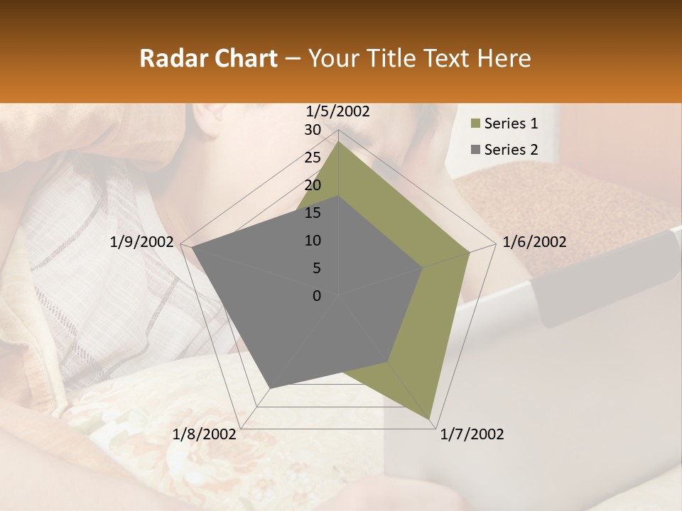 A Young Boy Laying In Bed Using A Laptop Computer PowerPoint Template