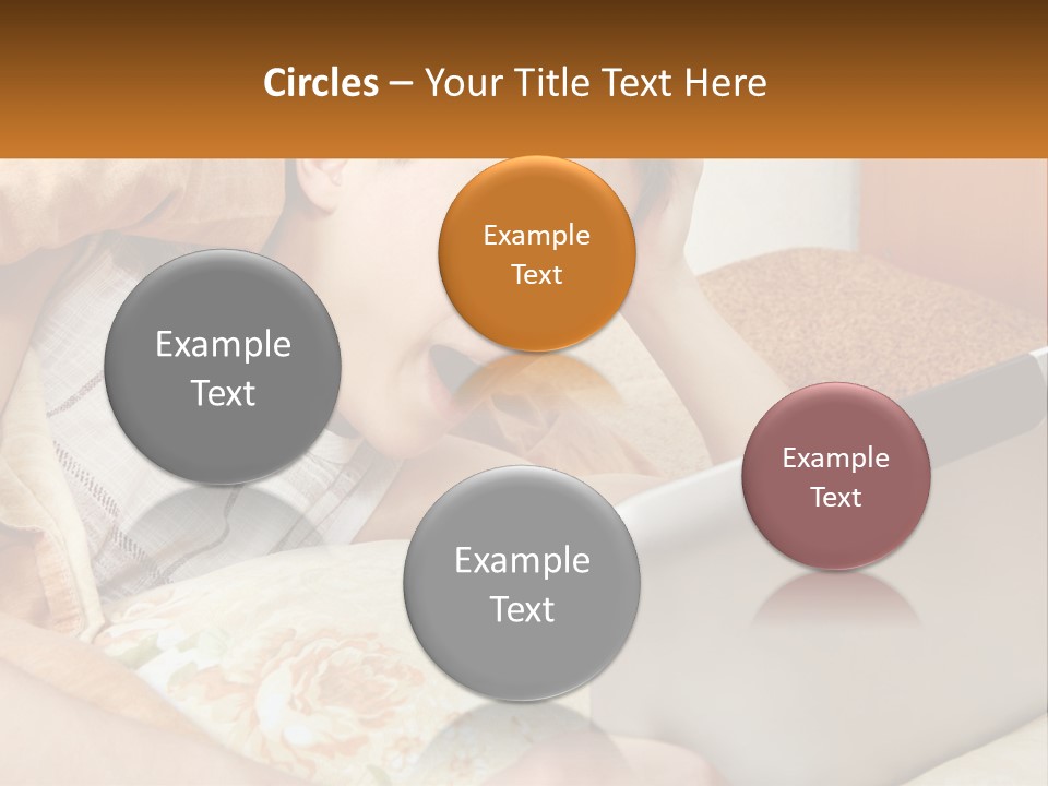 A Young Boy Laying In Bed Using A Laptop Computer PowerPoint Template