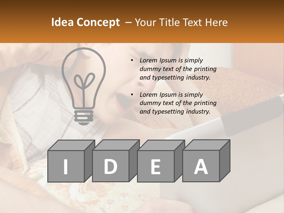 A Young Boy Laying In Bed Using A Laptop Computer PowerPoint Template