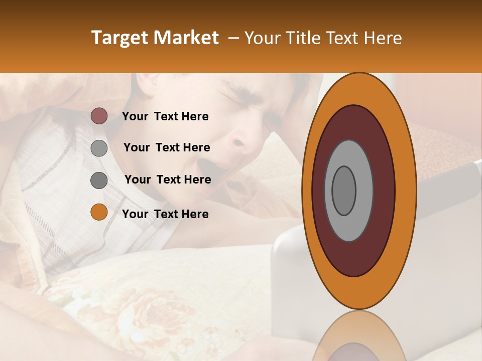 A Young Boy Laying In Bed Using A Laptop Computer PowerPoint Template