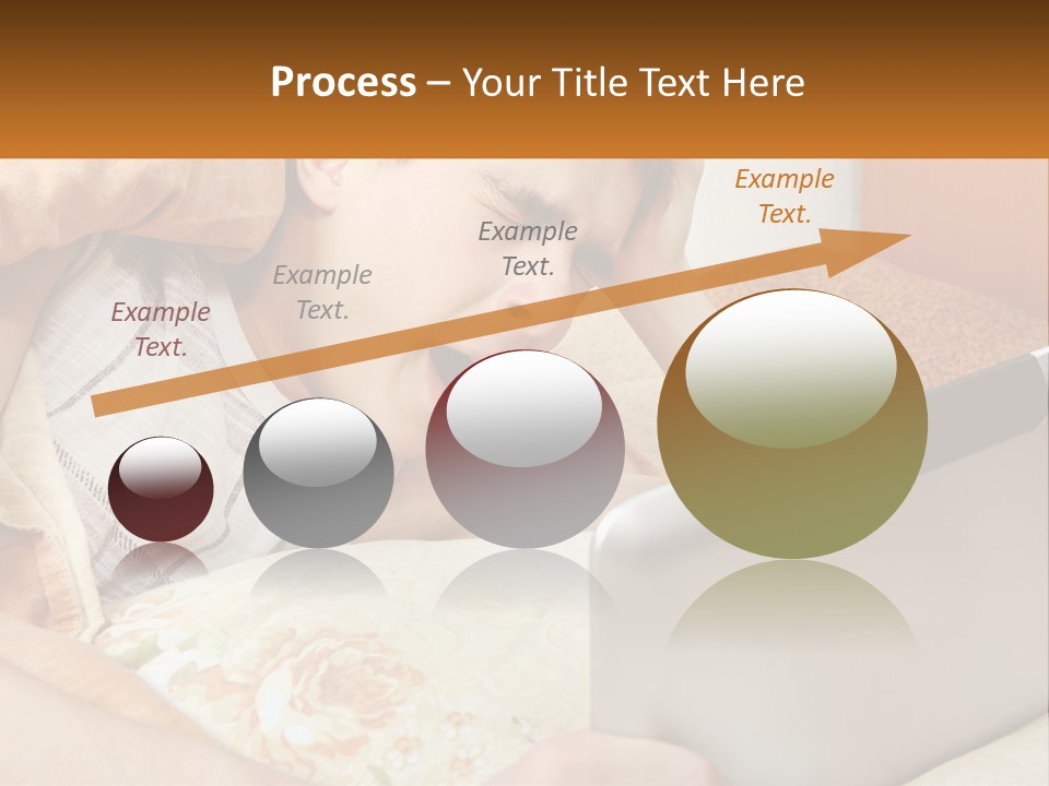 A Young Boy Laying In Bed Using A Laptop Computer PowerPoint Template