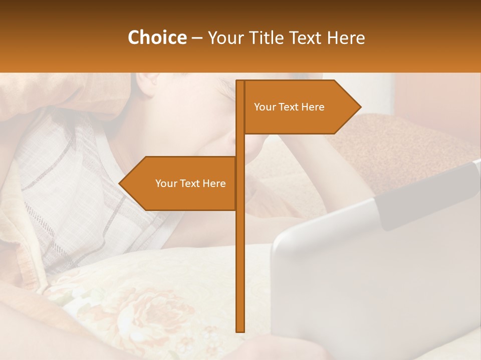 A Young Boy Laying In Bed Using A Laptop Computer PowerPoint Template