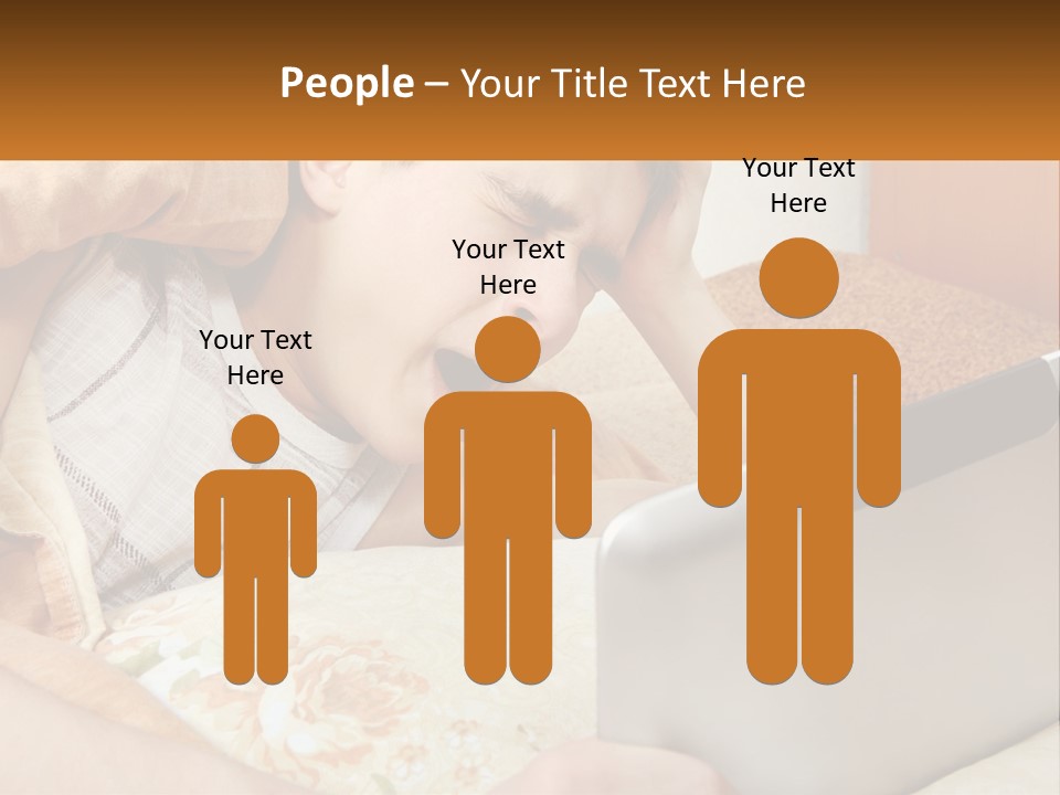 A Young Boy Laying In Bed Using A Laptop Computer PowerPoint Template