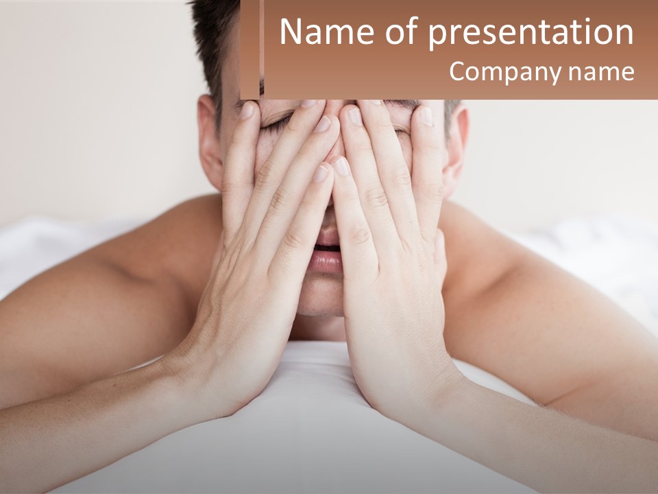 A Man Covering His Face With His Hands PowerPoint Template