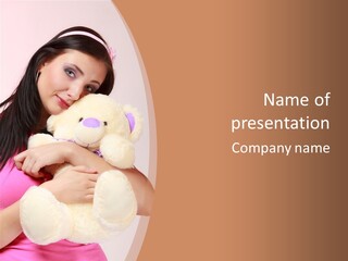 A Woman Holding A Teddy Bear In Her Arms PowerPoint Template
