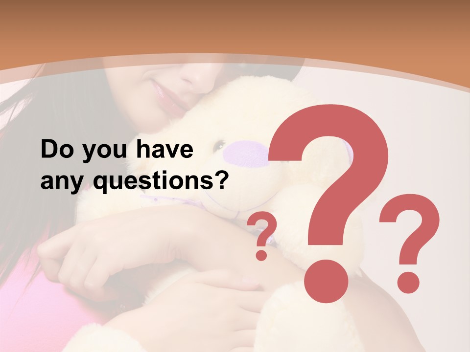 A Woman Holding A Teddy Bear In Her Arms PowerPoint Template