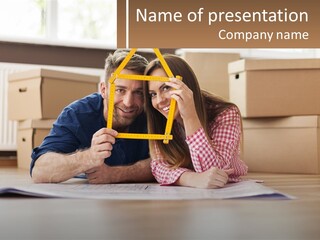 A Man And Woman Laying On The Floor Holding A Yellow Frame PowerPoint Template