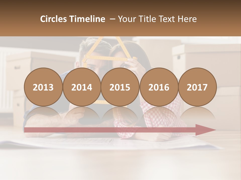 A Man And Woman Laying On The Floor Holding A Yellow Frame PowerPoint Template