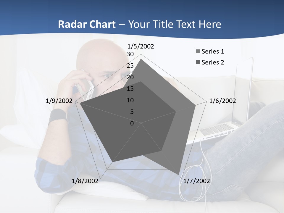 A Man Sitting On A Couch Talking On A Cell Phone PowerPoint Template