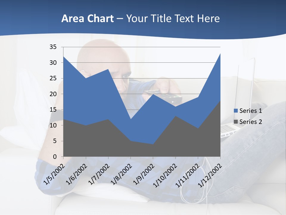 A Man Sitting On A Couch Talking On A Cell Phone PowerPoint Template