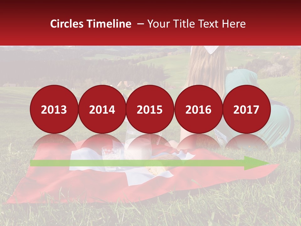 A Woman Sitting On Top Of A Blanket On Top Of A Lush Green Field PowerPoint Template