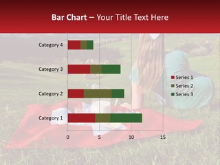 A Woman Sitting On Top Of A Blanket On Top Of A Lush Green Field PowerPoint Template