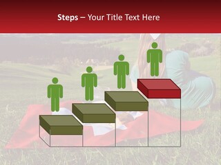 A Woman Sitting On Top Of A Blanket On Top Of A Lush Green Field PowerPoint Template