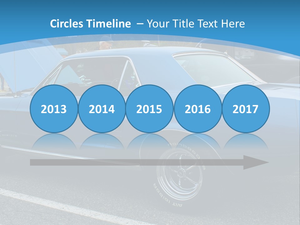 A Blue Car Is Parked In A Parking Lot PowerPoint Template