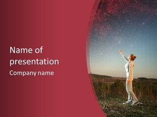 A Woman Standing In A Field With Her Arms In The Air PowerPoint Template