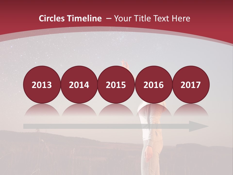 A Woman Standing In A Field With Her Arms In The Air PowerPoint Template