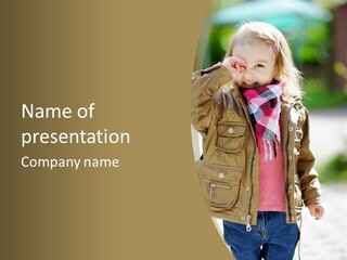 A Little Girl In A Brown Jacket Is Talking On A Cell Phone PowerPoint Template