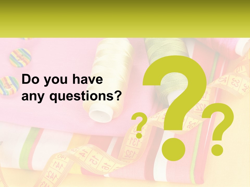 A Group Of Different Colored Spools Of Thread Next To Each Other PowerPoint Template