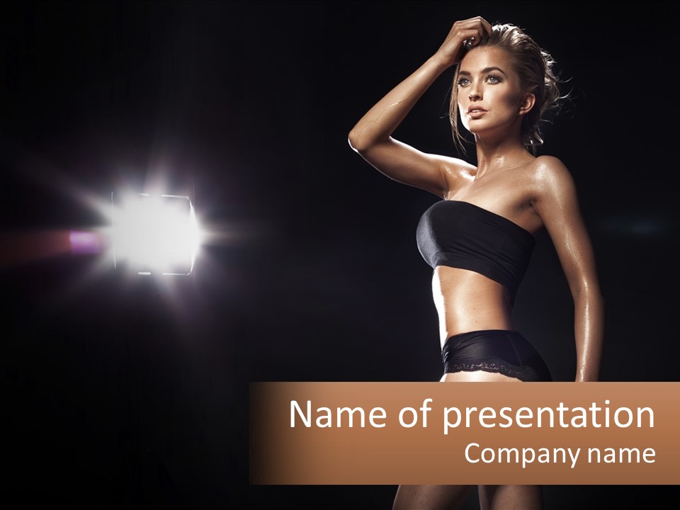 A Beautiful Woman In A Black Top Is Posing For A Picture PowerPoint Template