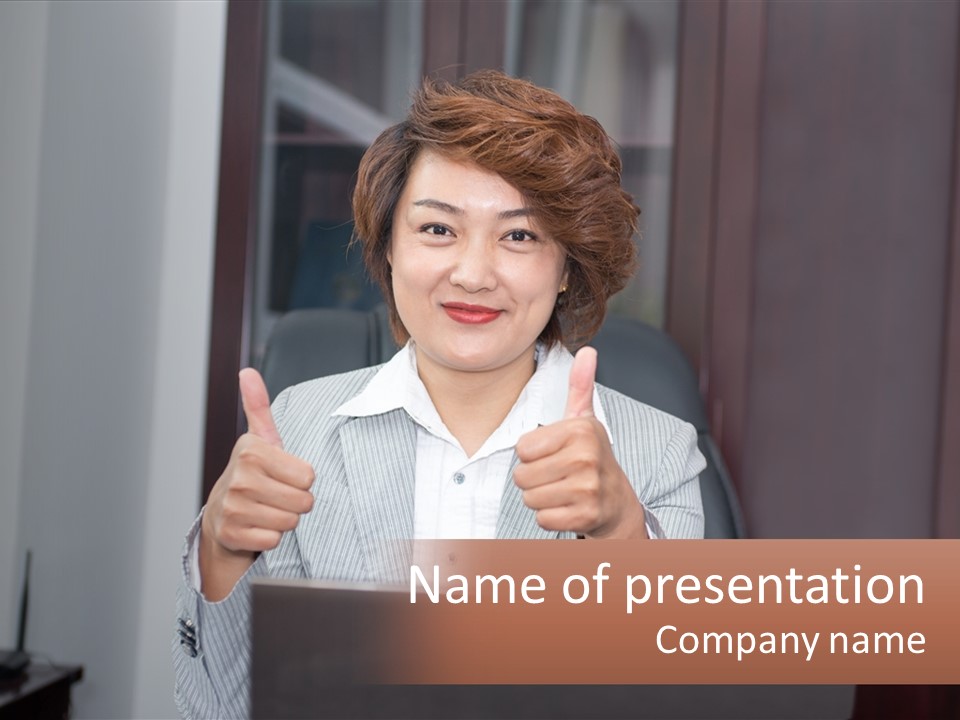 A Woman Giving A Thumbs Up In Front Of A Laptop PowerPoint Template
