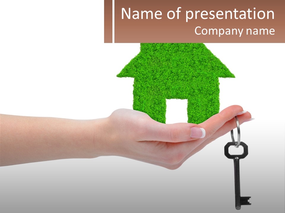 A Person Holding A Key To A Green House PowerPoint Template