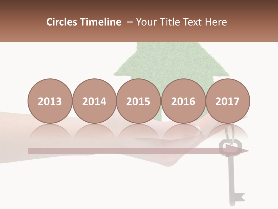 A Person Holding A Key To A Green House PowerPoint Template