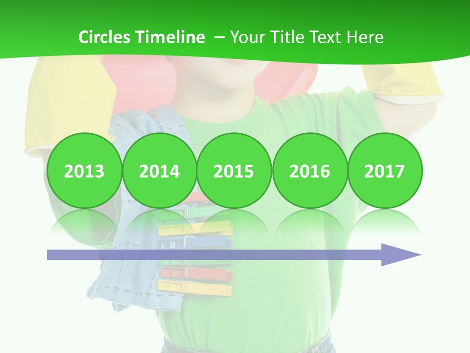 A Little Boy Is Holding A Toy In His Hands PowerPoint Template