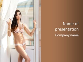 A Woman In A Bikini Posing In Front Of A Window PowerPoint Template