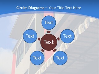 A Building With A Blue Sky In The Background PowerPoint Template