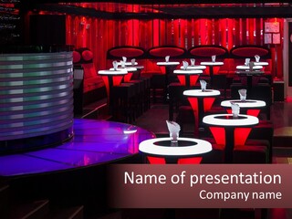 A Restaurant With Tables And Chairs With Red Lighting PowerPoint Template