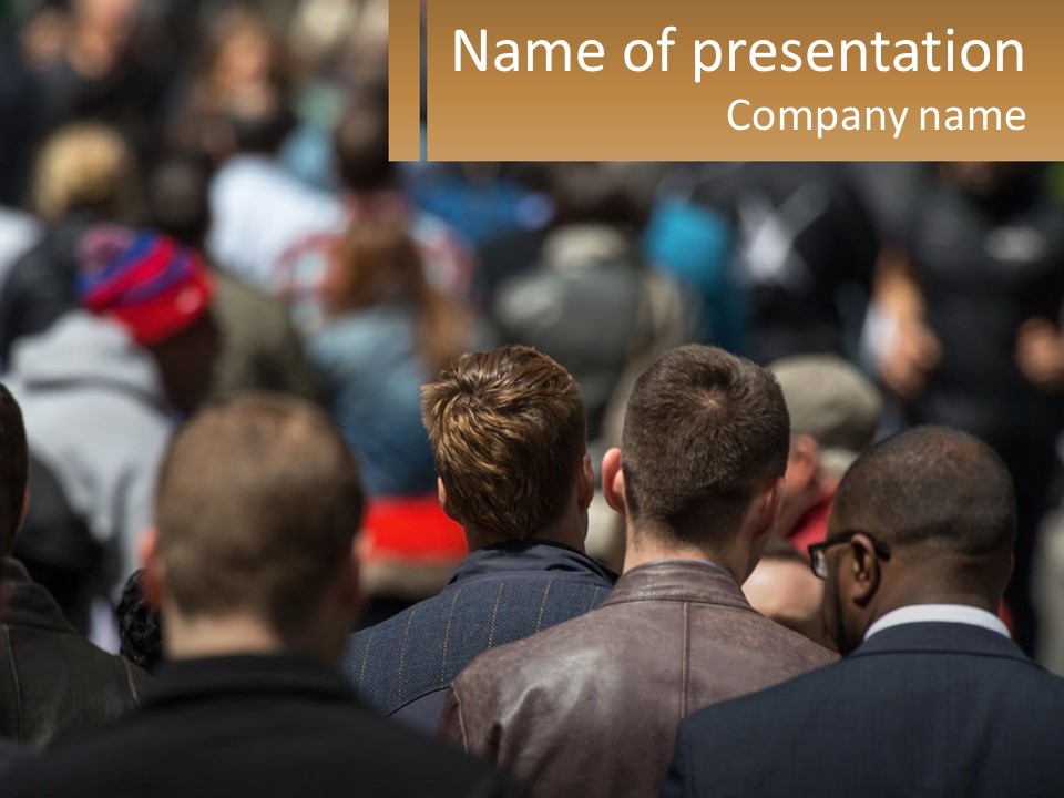 A Crowd Of People Walking Down A Street PowerPoint Template