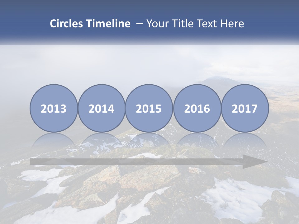 A Mountain Range Covered In Snow And Clouds PowerPoint Template