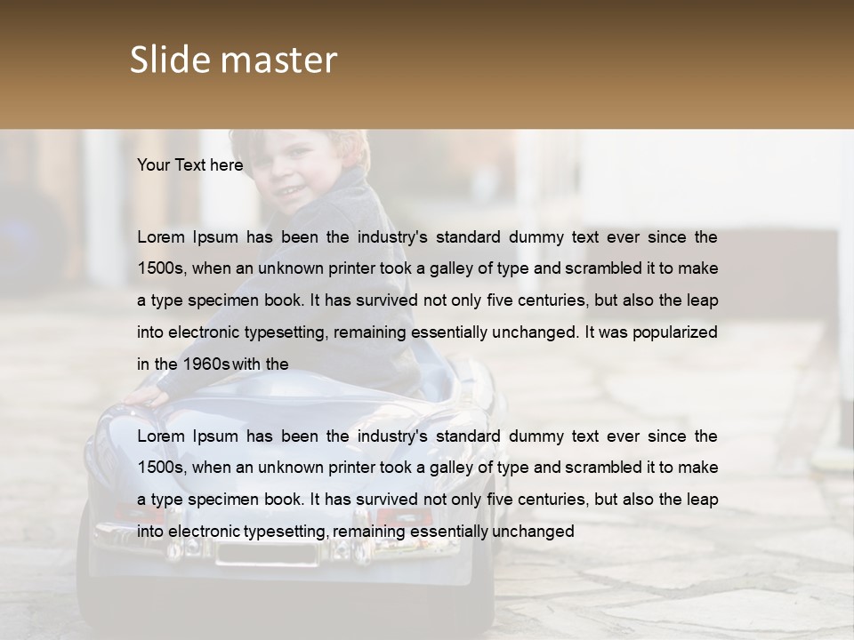 A Young Boy Is Sitting In A Toy Car PowerPoint Template