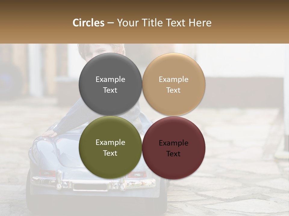 A Young Boy Is Sitting In A Toy Car PowerPoint Template