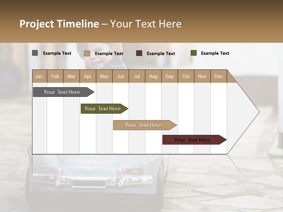 A Young Boy Is Sitting In A Toy Car PowerPoint Template