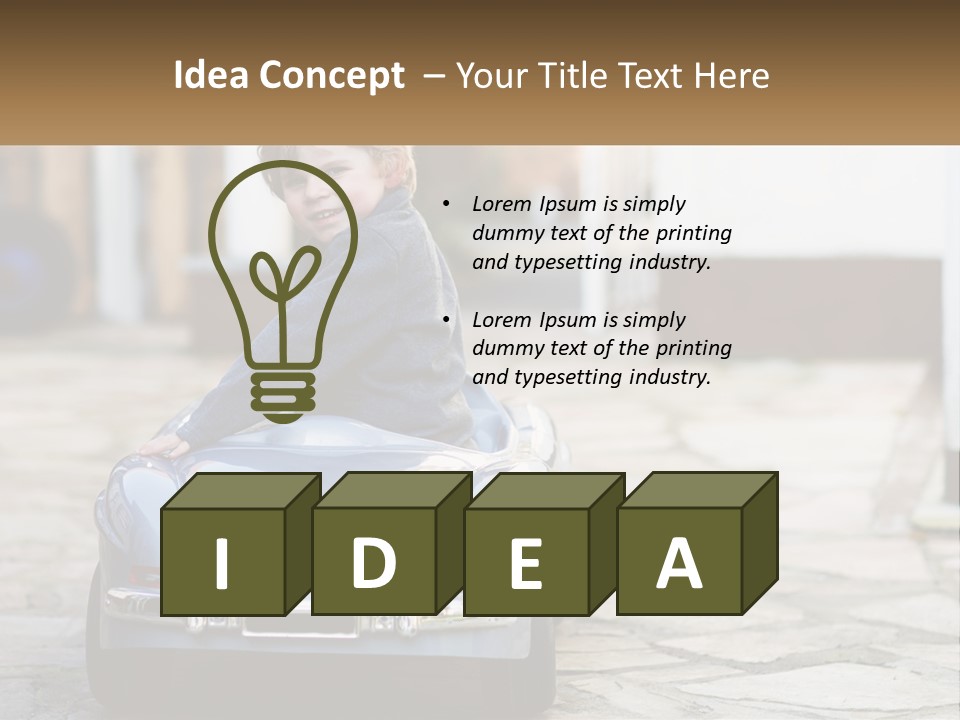 A Young Boy Is Sitting In A Toy Car PowerPoint Template