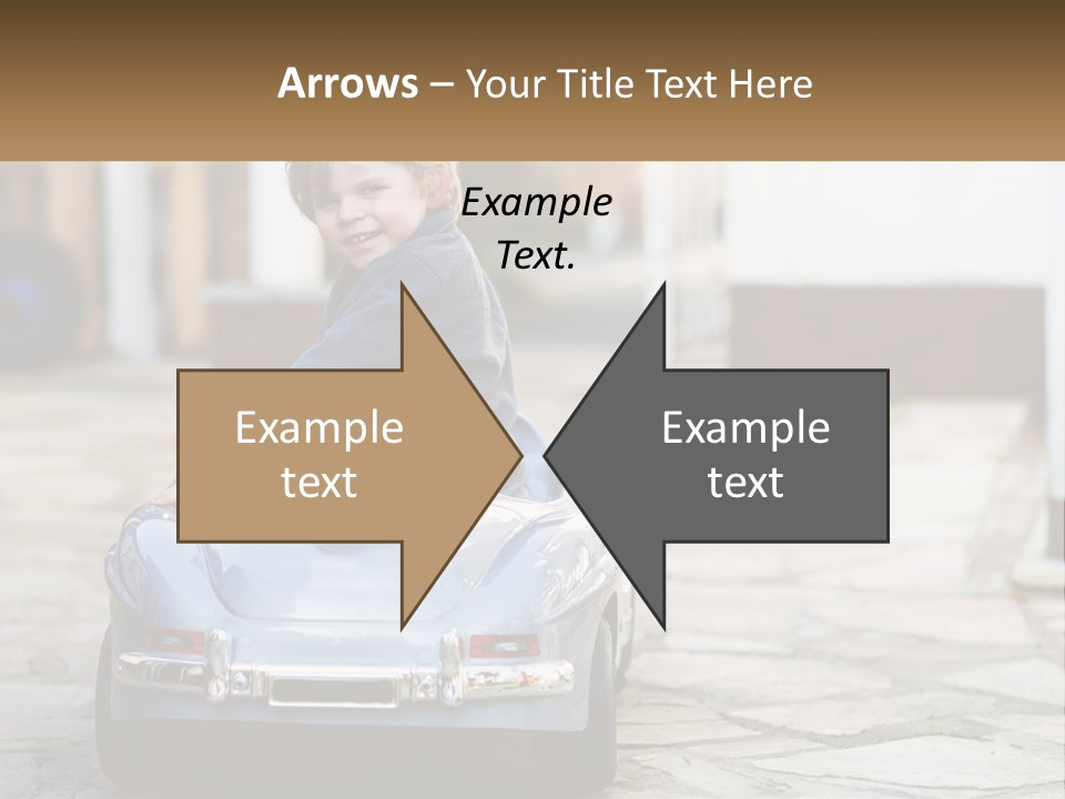 A Young Boy Is Sitting In A Toy Car PowerPoint Template