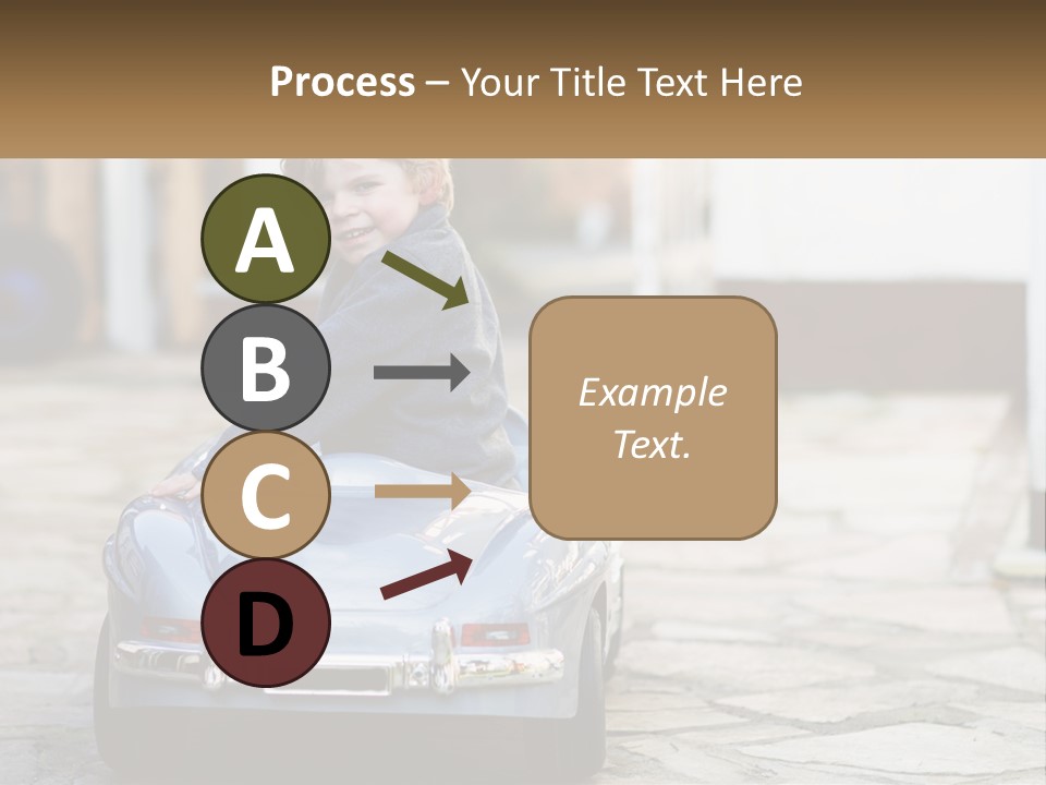 A Young Boy Is Sitting In A Toy Car PowerPoint Template