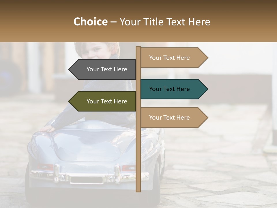 A Young Boy Is Sitting In A Toy Car PowerPoint Template